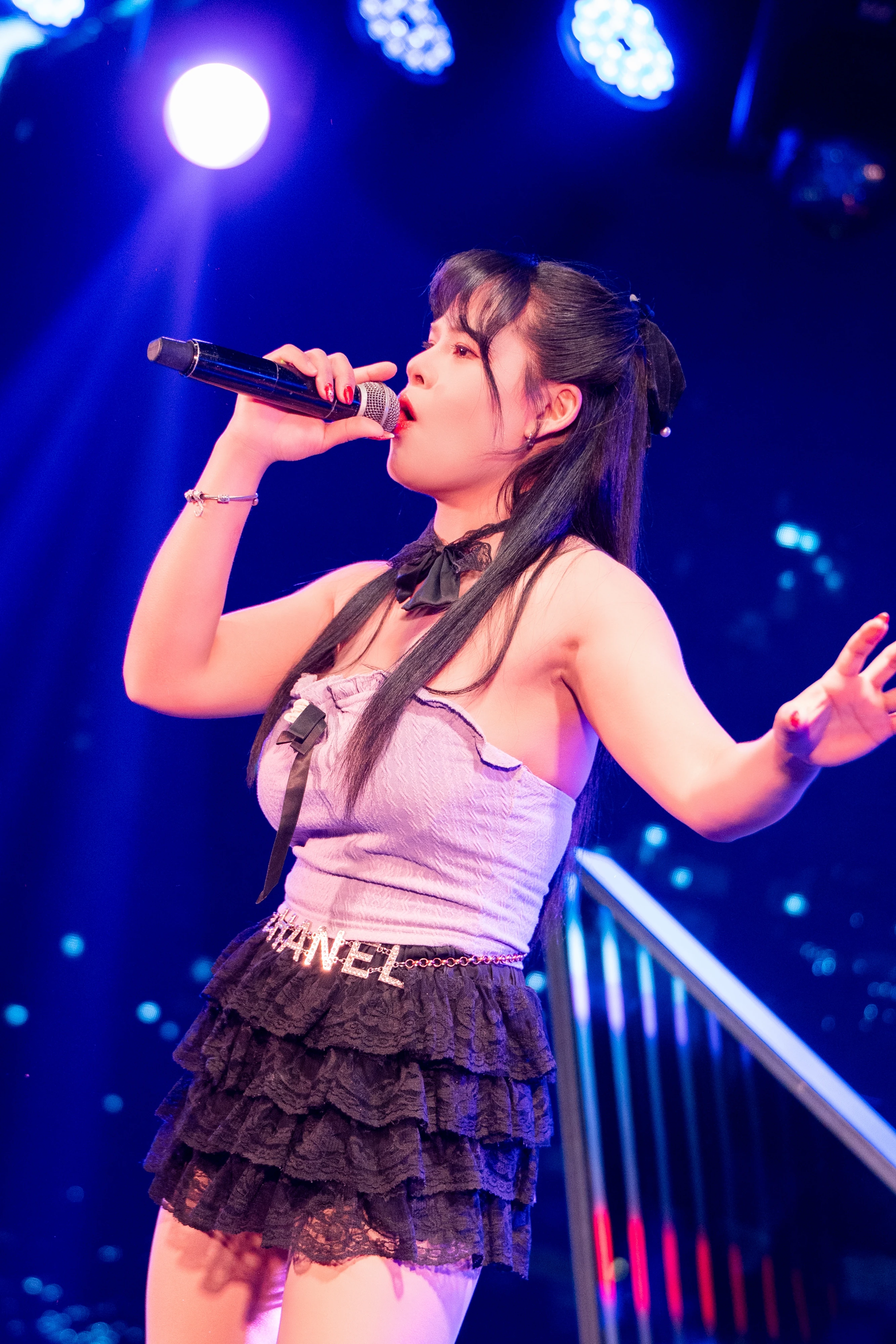Paragon singer in stage lights