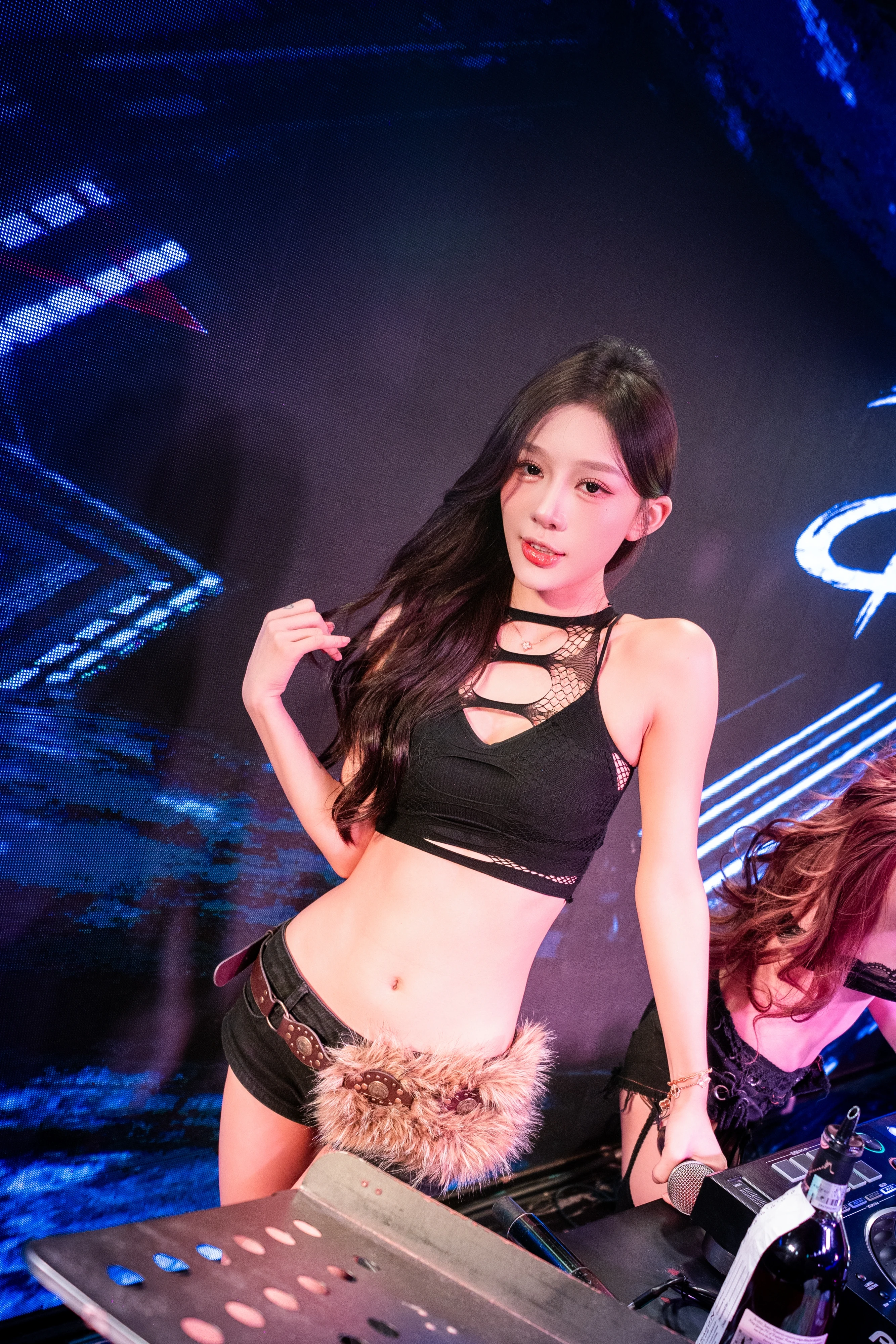 Dancer performing in front of the live band at Paragon Club, Cheras